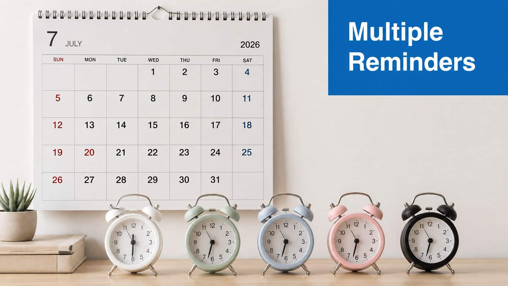 A wall calendar for July 2026 above five colorful alarm clocks sitting on a wooden desk.